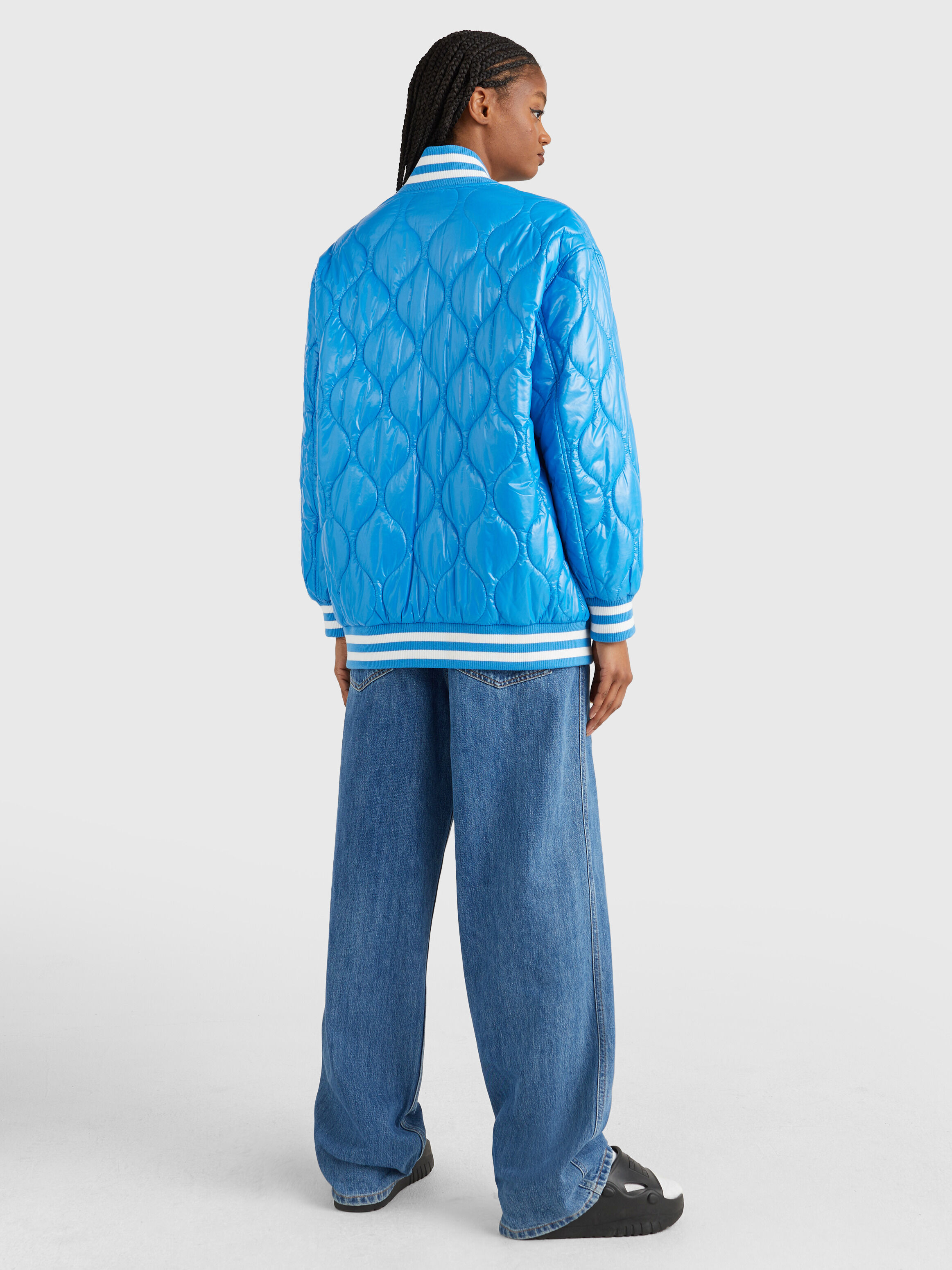 Blue quilted bomber jacket top